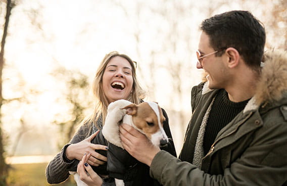 Young couple with dog